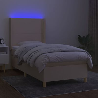 vidaXL Box spring postelja z vzmetnico LED krem 100x200 cm blago