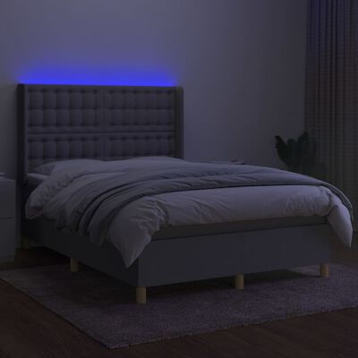 vidaXL Box spring postelja z vzmetnico LED sv. siva 140x200 cm blago