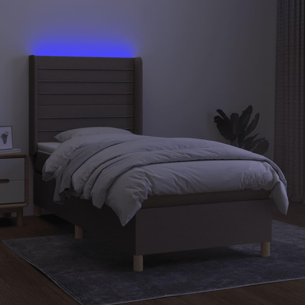 vidaXL Box spring postelja z vzmetnico LED taupe 100x200 cm blago