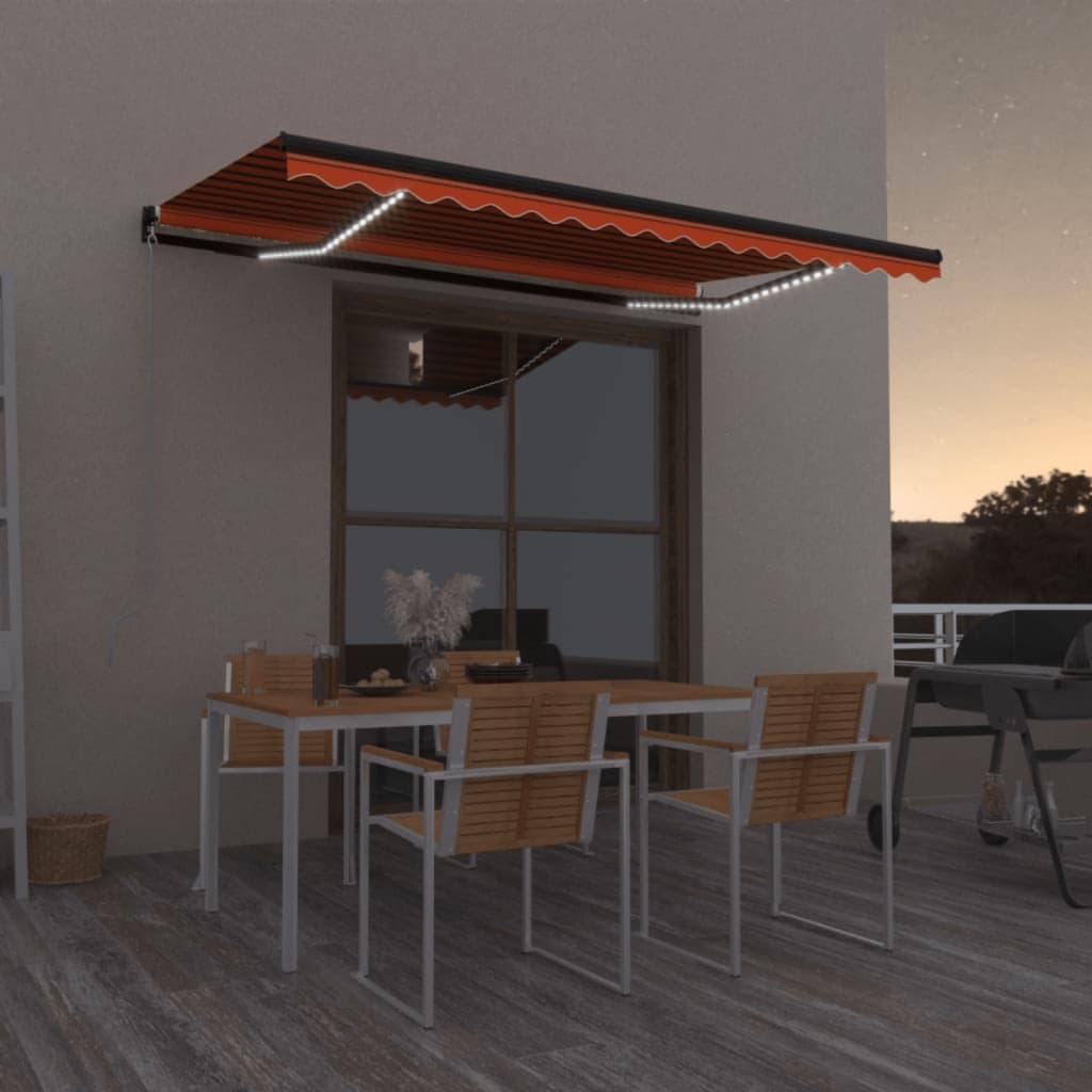 vidaXL Ročno zložljiva tenda z LED lučmi 450x350 cm oranžna in rjava