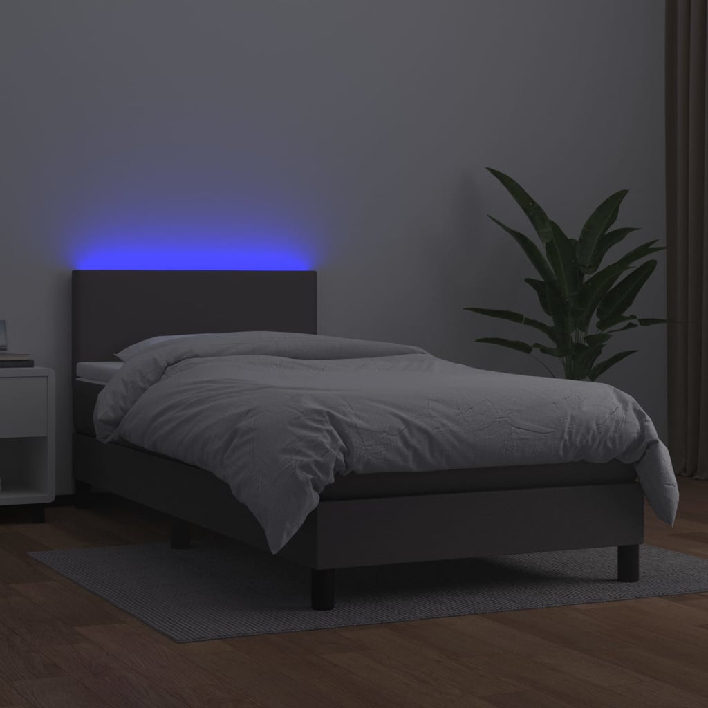 vidaXL Box spring postelja z vzmetnico LED siva 90x200 cm umetno usnje